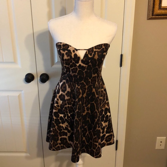 bebe Dresses & Skirts - Bebe leopard cocktail dress💗